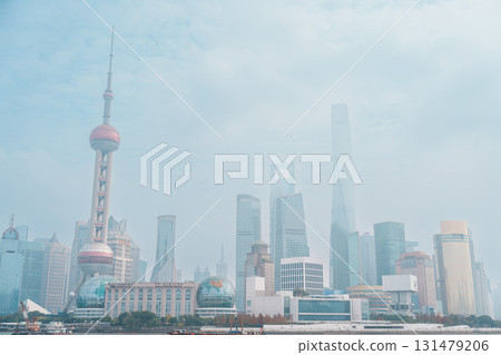 Cityscape view of Shanghai city in the morning. Skyscraper of Lujiazui in Pudong, view from The Bund of Shanghai, China. landmark and popular for tourism attractions. Travel and Vacation concept Cityscape view of Shanghai city in the morning. Skyscraper of Lujiazui in Pudong, view from The Bund of Shanghai, China. landmark and popular for tourism attractions. Travel and Vacation concept 131479206