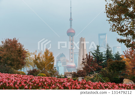 Cityscape view of Shanghai city, China. Skyscraper of Lujiazui in Pudong with qingren flower sight garden. landmark and popular for tourism attractions. Travel and Vacation concept 131479212