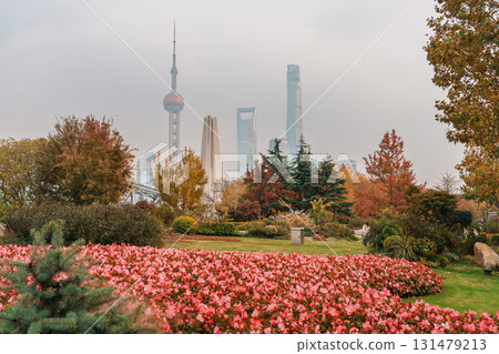 Cityscape view of Shanghai city, China. Skyscraper of Lujiazui in Pudong with qingren flower sight garden. landmark and popular for tourism attractions. Travel and Vacation concept 131479213
