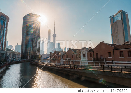 Cityscape view of Shanghai city in the morning. Skyscraper of Lujiazui in Pudong, view from Hongkou Gang canal of Shanghai, China. landmark and popular for tourism attraction. Travel and vacation Cityscape view of Shanghai city in the morning. Skyscraper of Lujiazui in Pudong, view from Hongkou Gang canal of Shanghai, China. landmark and popular for tourism attraction. Travel and vacation 131479221