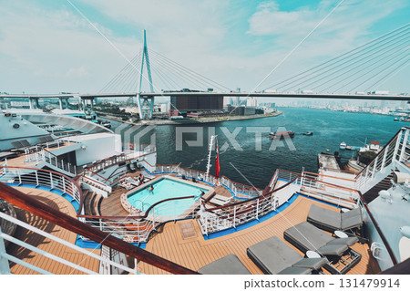 Osaka cityscape and a large cruise ship's pool 131479914