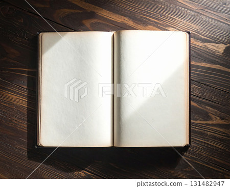 open book on wooden table 131482947
