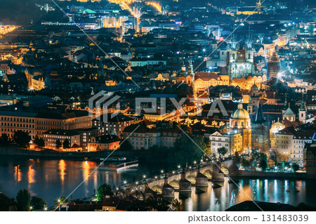 Night panorama of Prague, Czech Republic. Castle, Charles Bridge and Vltava river. Night panorama of Prague, Czech Republic. Castle, Charles Bridge and Vltava river. 131483039