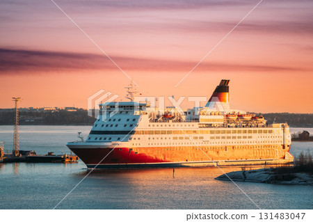 Helsinki, Finland. View Of Modern Ferry Ferryboat Floating Island At Sunrise Sky Helsinki, Finland. View Of Modern Ferry Ferryboat Floating Island At Sunrise Sky 131483047