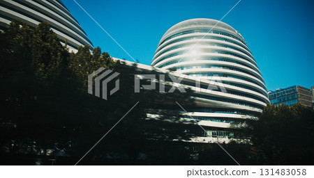 Beijing, China. Galaxy SOHO is an urban complex building located in Beijing, China. Built between 2009 and 2012, it is the first of three buildings designed by Iraqi-British architect Zaha Hadid 131483058