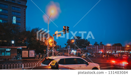 Illuminated Trees Along Street with Night City Vibe Illuminated Trees Along Street with Night City Vibe 131483084