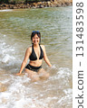 happily playing in the sea 131483598