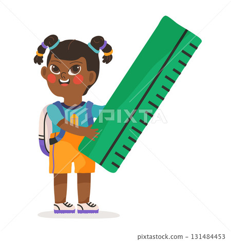 A cute schoolgirl holds a ruler in her hands. Back to School concept. Preschooler ready for first lesson 131484453