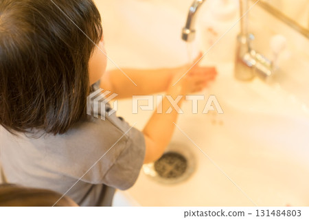 Children washing their hands at a nursery school 131484803