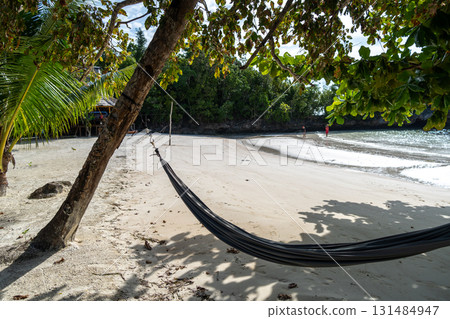 Hammock at Lia Beach, Waleakodi Island, Togian Archipelago, Indonesia 131484947