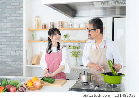 Middle-aged couple cooking in the kitchen 131485055