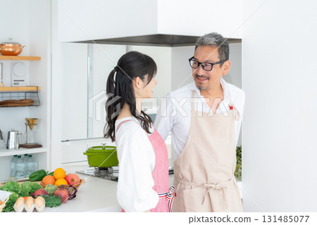 Middle-aged couple cooking in the kitchen 131485077