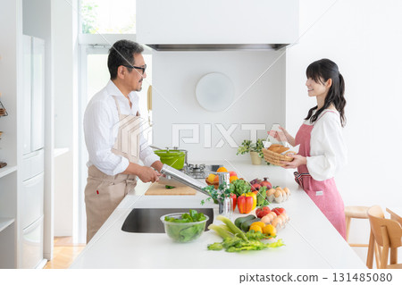 Middle-aged couple cooking in the kitchen 131485080
