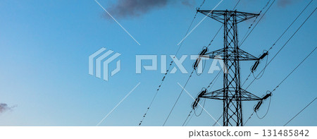 Blue sky and power lines before sunset Blue sky and power lines before sunset 131485842