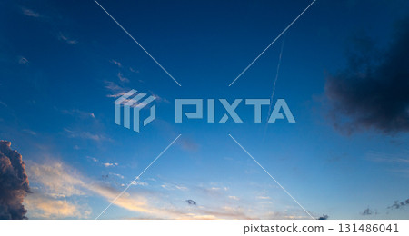 A simple scene of blue sky and dramatic clouds before sunset A simple scene of blue sky and dramatic clouds before sunset 131486041