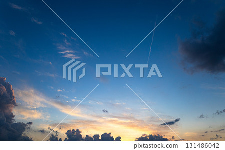 A simple scene of blue sky and dramatic clouds before sunset A simple scene of blue sky and dramatic clouds before sunset 131486042