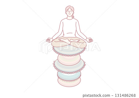 Woman meditate sitting on rocks 131486268
