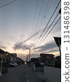 Contrails in a residential area 131486398