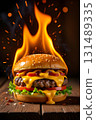 Flames burned the hamburger placed on the wooden table. 131489335