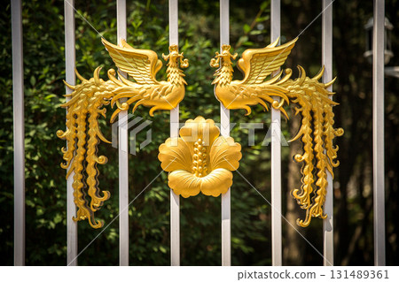 The golden phoenix pattern on the main gate of the Blue House in South Korea The golden phoenix pattern on the main gate of the Blue House in South Korea 131489361