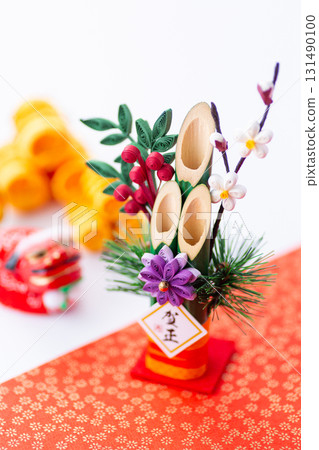New Year's pine decoration on a red and white background 131490100