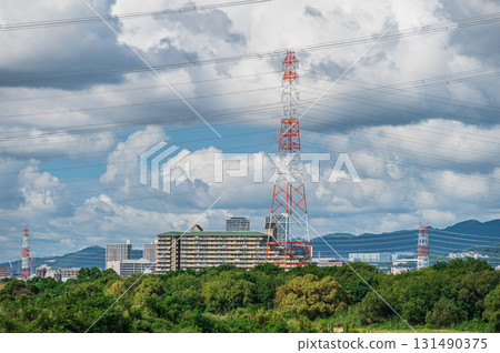 Power line tower standing on the banks of the Yodo River, Takatsuki City, Osaka Prefecture Power line tower standing on the banks of the Yodo River, Takatsuki City, Osaka Prefecture 131490375