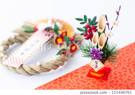 New Year's pine decoration on a red and white background New Year's pine decoration on a red and white background 131490761