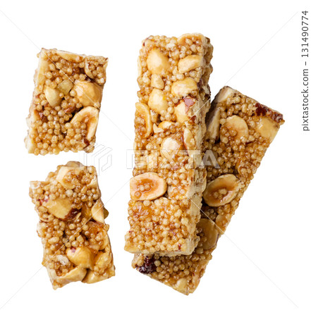 Granola bars with nuts cut out on a white. Top view Granola bars with nuts cut out on a white. Top view 131490774