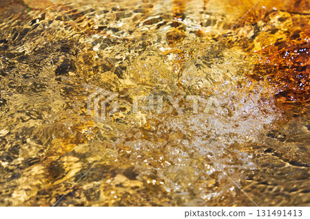 Early summer waterside: Close-up of the clear stream's water surface 223 131491413