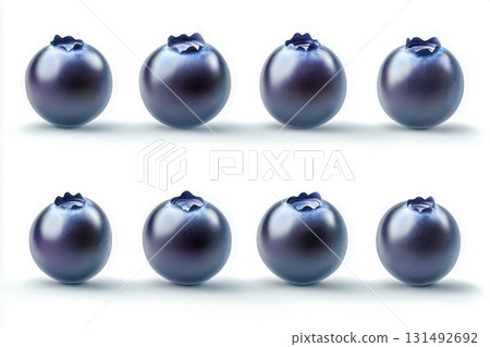 Fresh blueberries are lined up in two rows, displaying their deep blue color and glossy skin under bright light 131492692