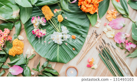 Loy Krathong flat lay with flowers and candle on wooden background 131493103