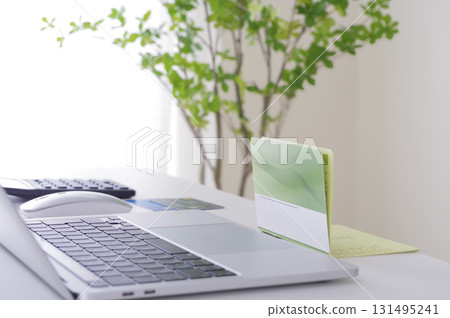 Computer and savings passbook Computer and savings passbook 131495241