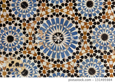 Ornamental and colorful arabesque carvings, mosaic tiles, zellige, medina of Tangier, Morocco 131495984