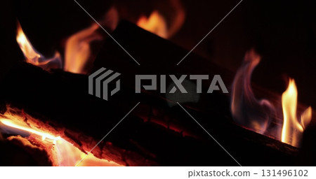 Firewood is burning in the fireplace. Close-up fire. Firewood close-up. Fire close-up. 131496102