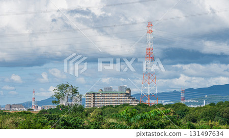 Power line tower standing on the banks of the Yodo River, Takatsuki City, Osaka Prefecture 131497634