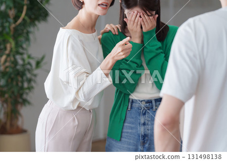 A woman gets angry at a man who made her friend cry 131498138