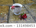 A cup of coffee outside on an autumn day  131498453
