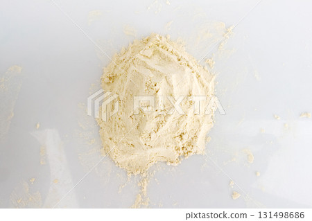 Protein Powder on White Background Front and Top View Photostock Protein Powder on White Background Front and Top View Photostock 131498686