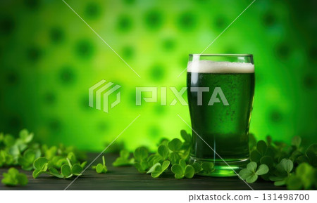 Glass of green foamy irish beer stands on green grassy clover background. St. Patrick Day Glass of green foamy irish beer stands on green grassy clover background. St. Patrick Day 131498700