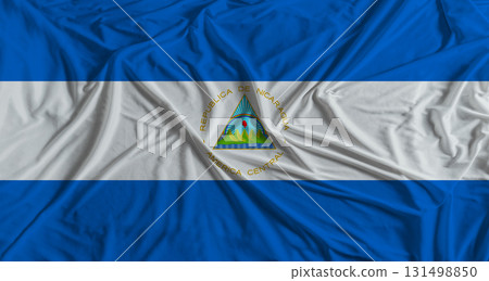 Nicaraguan flag with fabric texture background. National flag of Nicaragua Nicaraguan flag with fabric texture background. National flag of Nicaragua 131498850