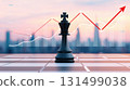 chess or chess piece concept. Strategic chess king with rising graph and cityscape background at sunset symbolizes success 131499038