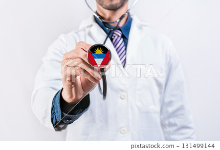 Antigua and Barbuda healthcare system, doctor holding stethoscope. Antigua and Barbuda health and medical insurance concept 131499144