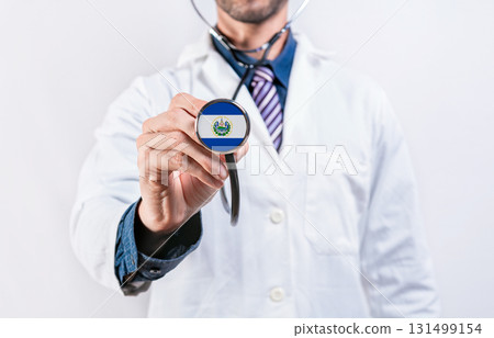 El Salvador healthcare system, doctor holding stethoscope. El Salvador health and medical insurance concept El Salvador healthcare system, doctor holding stethoscope. El Salvador health and medical insurance concept 131499154