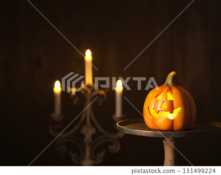 Halloween image: ghost pumpkin and candles 131499224
