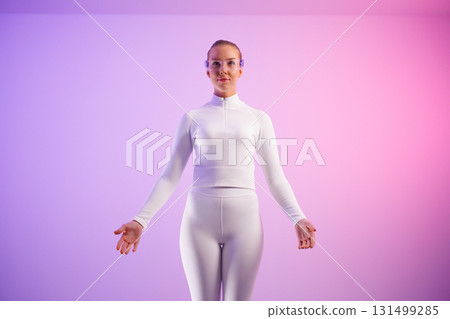Woman in smartglasses against colored background Woman in smartglasses against colored background 131499285
