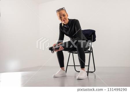 Woman resting during workout session 131499290