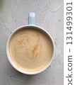 cup of coffee on concrete table, top view 131499301