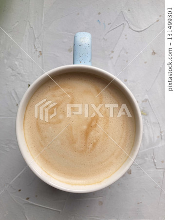 cup of coffee on concrete table, top view cup of coffee on concrete table, top view 131499301