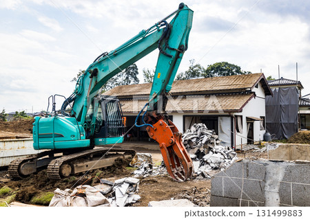 Demolition work site Heavy backhoe Demolition work site Heavy backhoe 131499883