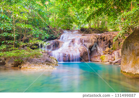 Beautiful waterfall in wild rainforest in Erawan National park, Thailand 131499887